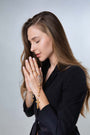 Olive wood rosary on model — Marina Jewelry Holy Land