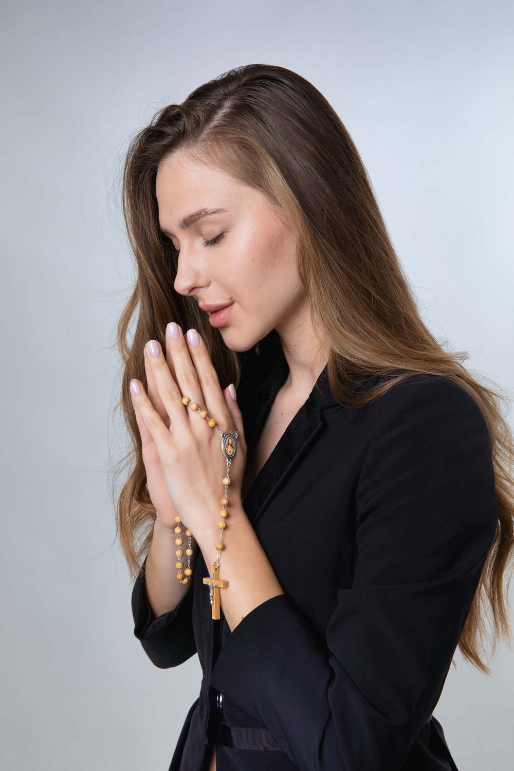 Olive wood rosary on model — Marina Jewelry Holy Land